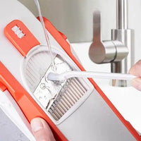 Easy-to-Clean Orange and White Mandoline Slicer for Quick Veggie Prep - Estalios