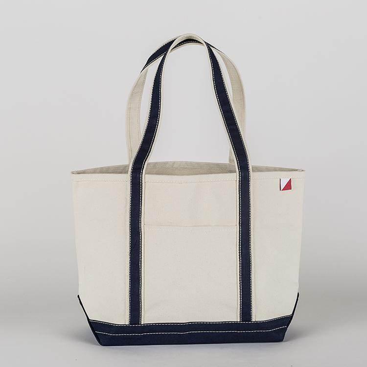Elevate Your Style with Quality Apparel, Footwear, and More 

ShoreBags Classic Tote Medium with Lined Pockets for Utility - Estalios