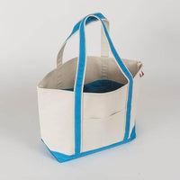 Elevate Your Style with Quality Apparel, Footwear, and More 

ShoreBags Classic Tote Medium with Lined Pockets for Utility - Estalios