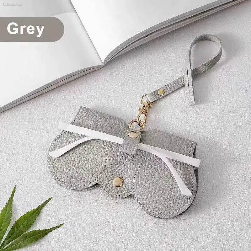 Grey leather glasses case.