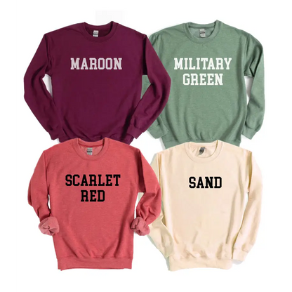 Four crewneck sweatshirts in maroon, military green, scarlet red sold, and sand