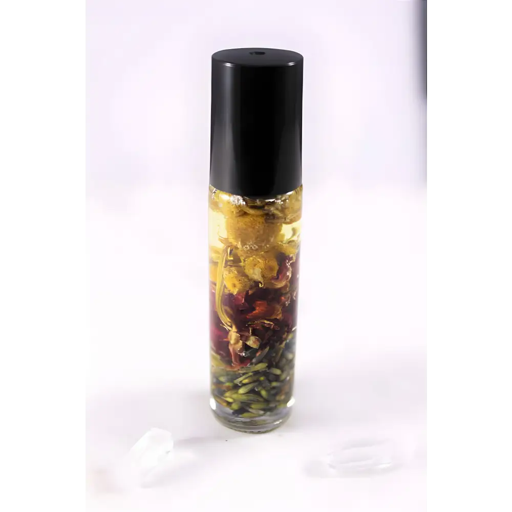 Aromatic oil roller with dried flowers for an organic essential oil perfume blend