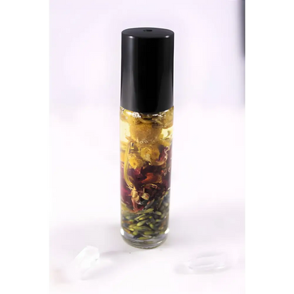 Aromatic oil roller with dried flowers for an organic essential oil perfume blend