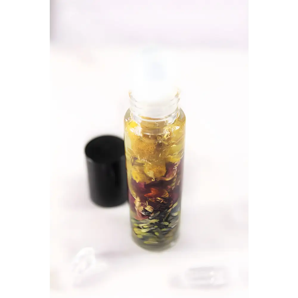 Glass bottle with floral infusion in Floral Essential Oil Perfume Roll-On for a fresh scent