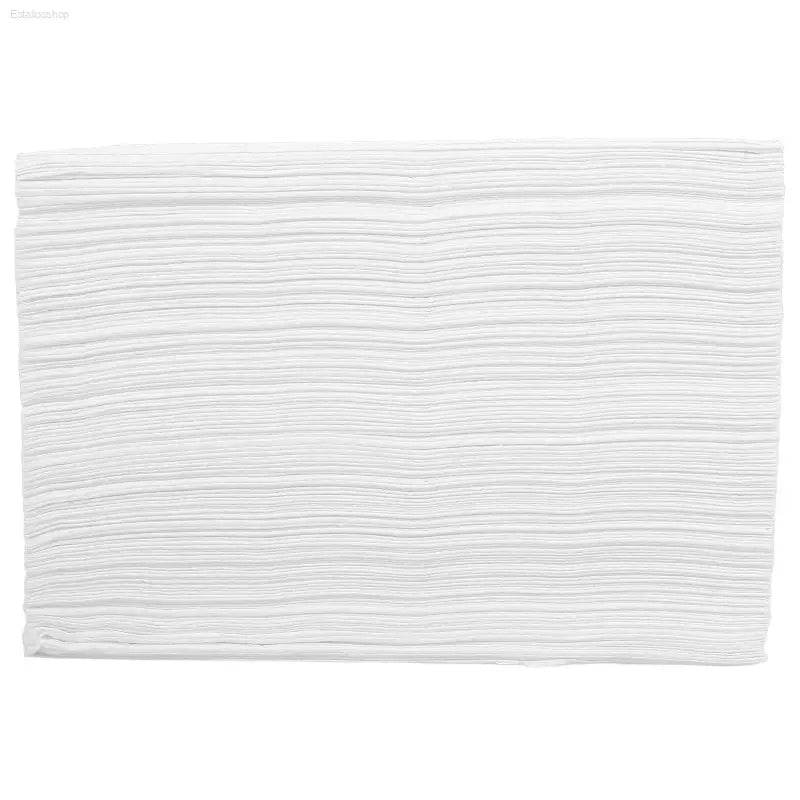 Stack of white paper napkins.