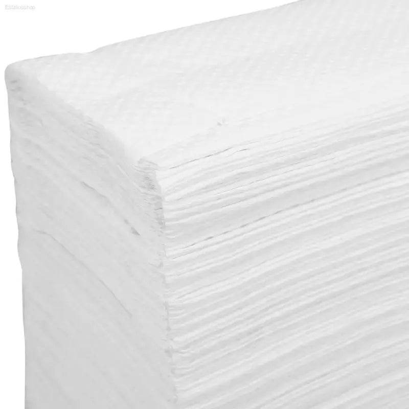 Stack of white paper napkins.