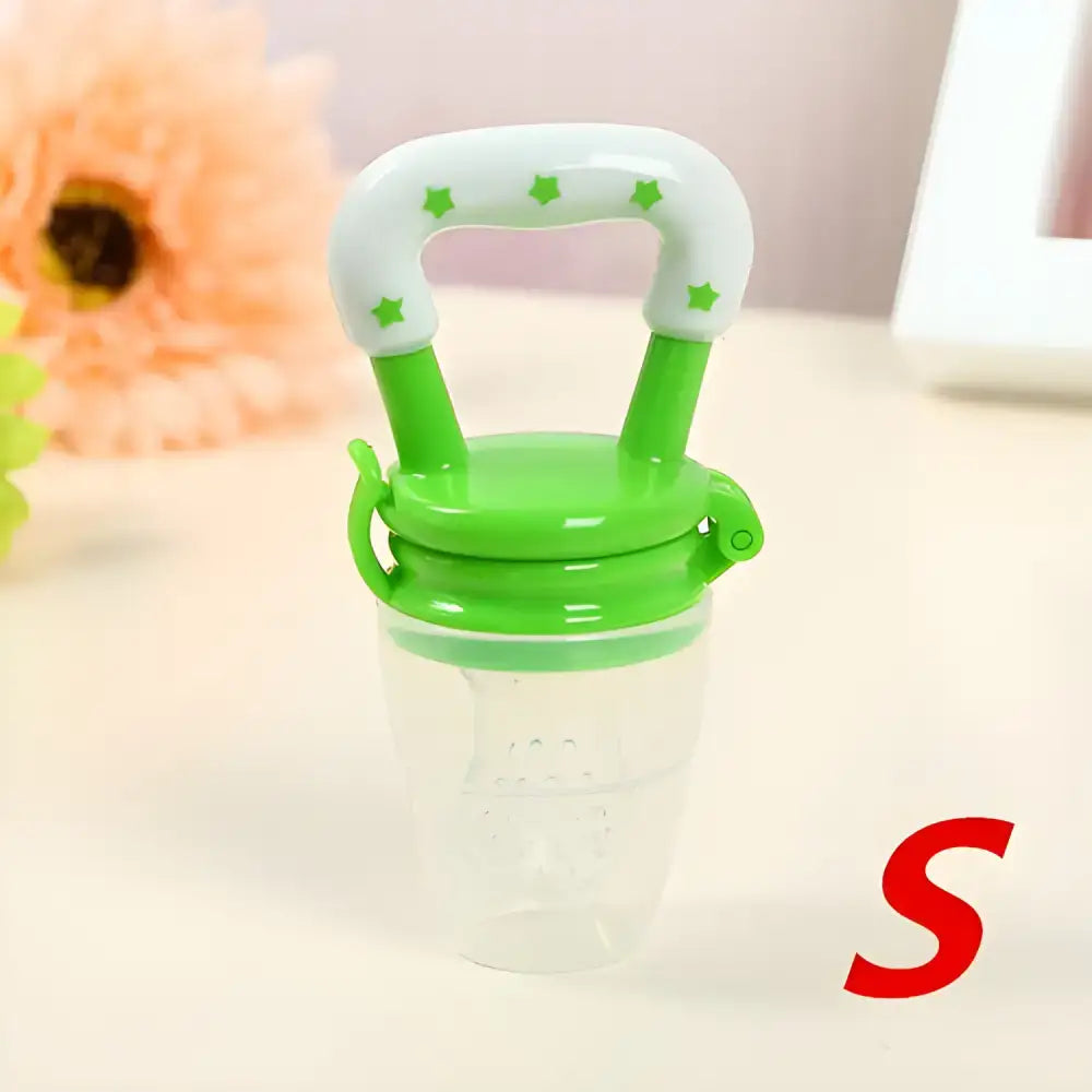 Green and white Fresh Food Nibbler baby pacifiers feeder for easy eating