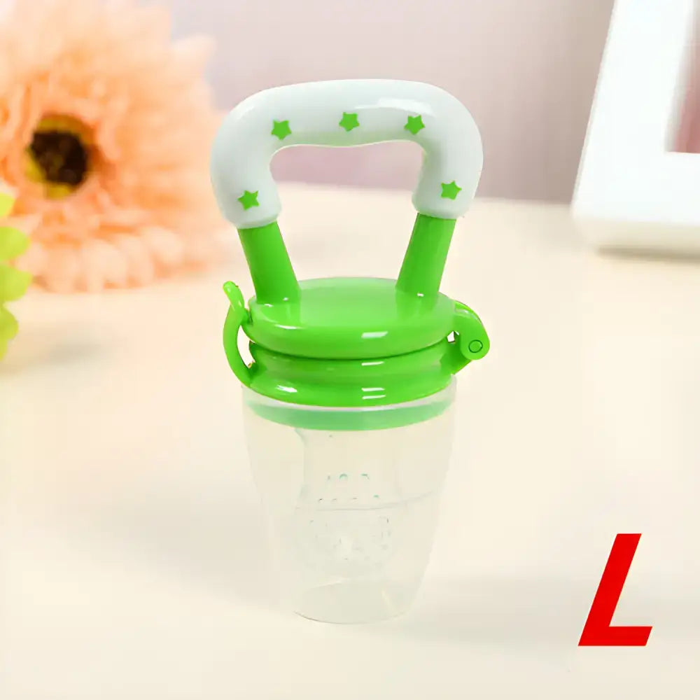 Green and white Fresh Food Nibbler baby pacifiers feeder for safe healthy eating