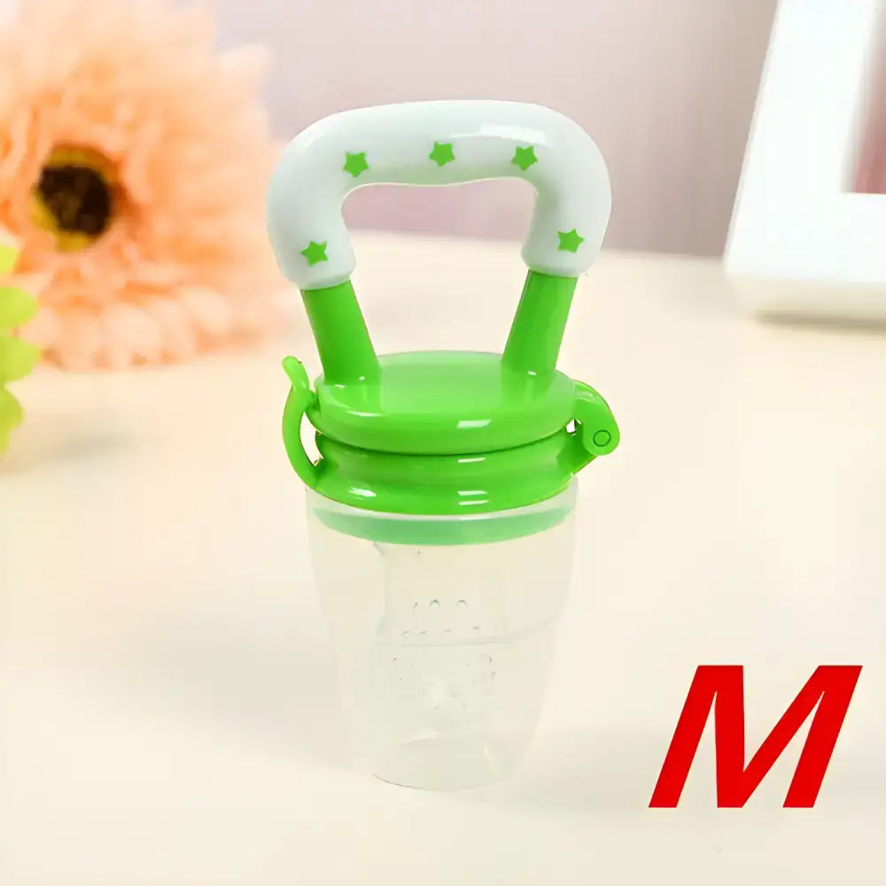 Green and white Fresh Food Nibbler baby pacifiers feeder for safe teething and snacking