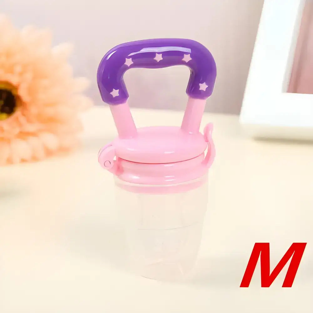 Baby food feeder with purple handle from Fresh Food Nibbler Baby Pacifiers range