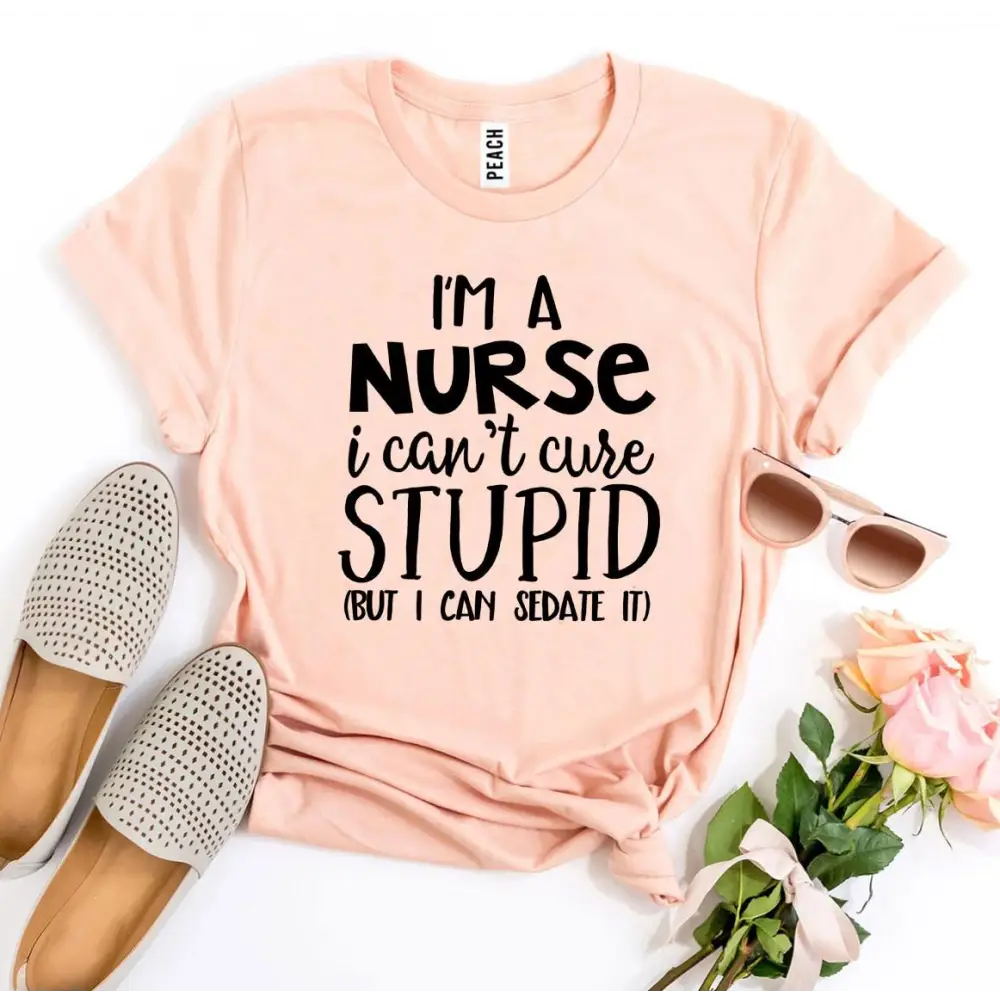 Peach-colored t-shirt with funny nurse slogan inspired by Heather Gray Sold style