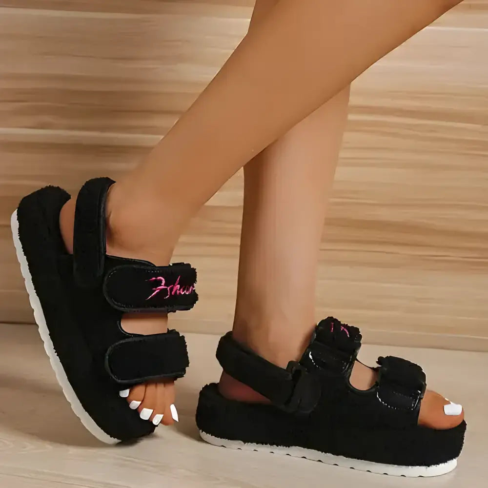 Black fuzzy platform sandals from Fuzzy Platform Sandals Shoe Deals for comfy style