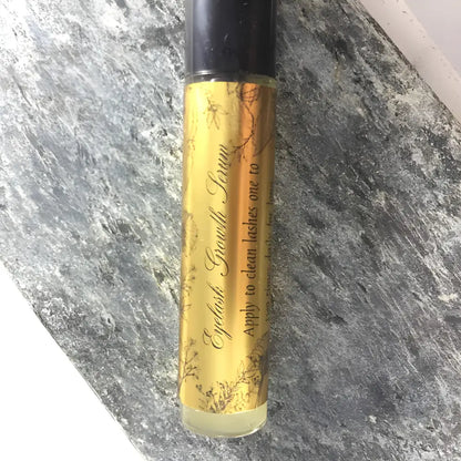 Get Lush Lashes Eyelash Growth Serum in a stylish gold tube for glorious lashes