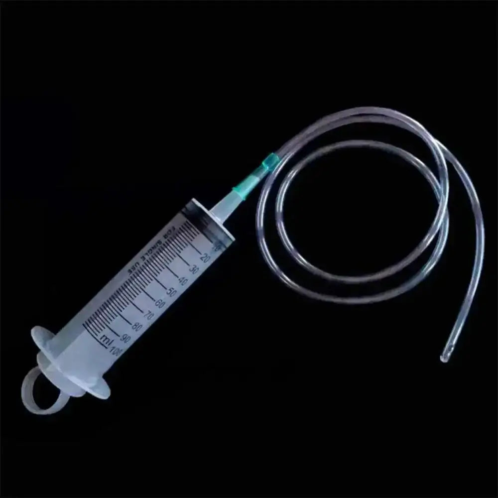 Clear plastic syringe with tubing, perfect for 550ml large capacity oil pump use