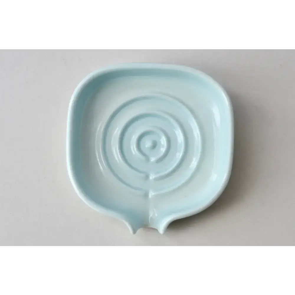 Light blue ceramic soap dish in glossy cobalt blue, perfect for self-draining porcelain soap