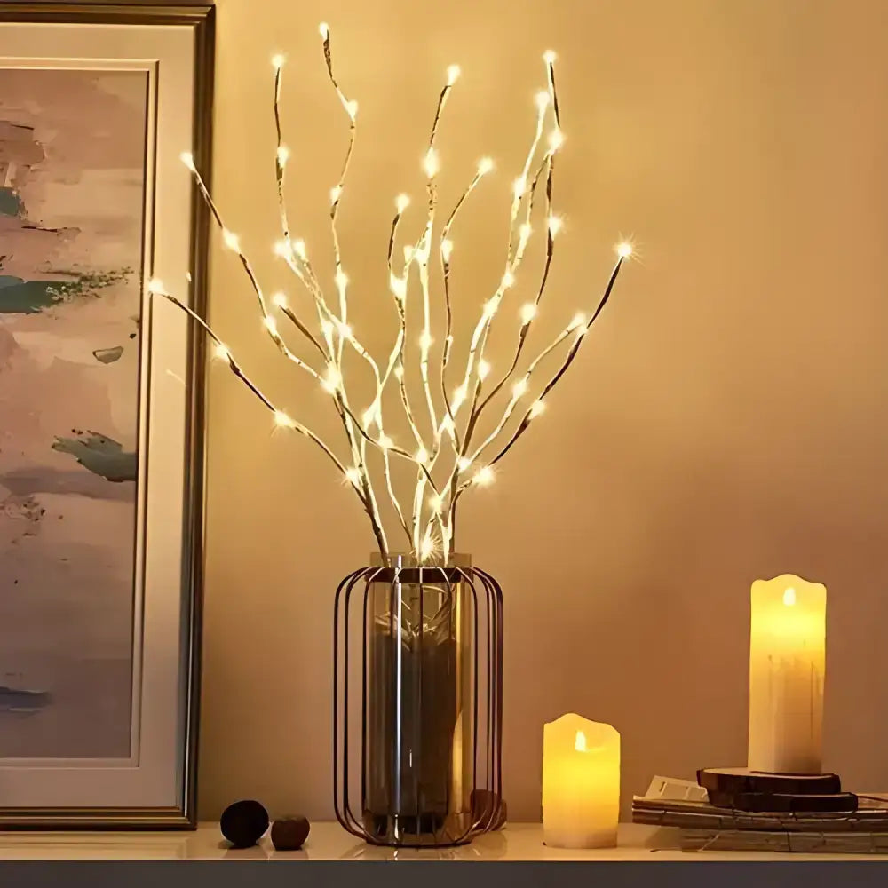 Glowing White Birch Branch Lights showcasing illuminated decorative branches in a vase