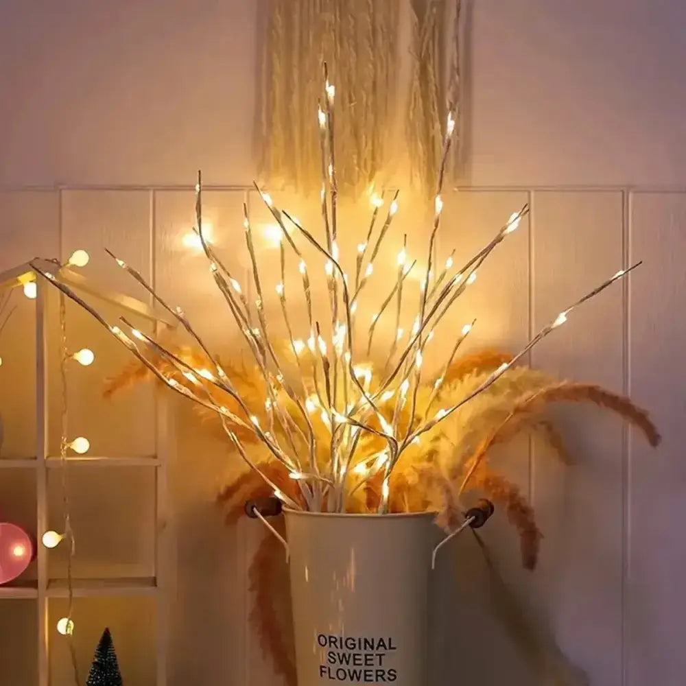 Illuminated white birch branch light in a bucket for cozy decor vibes