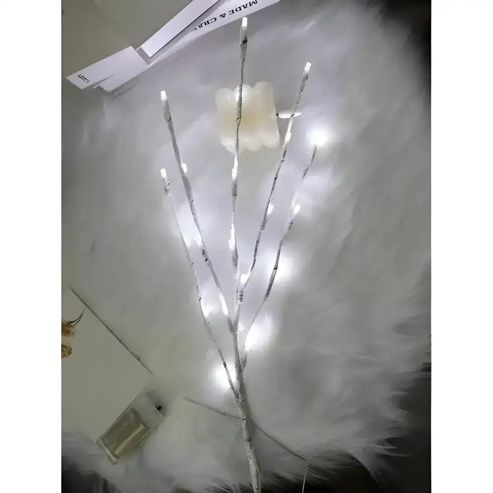 Illuminated white birch branch lights add a cozy glow to any space with LED charm