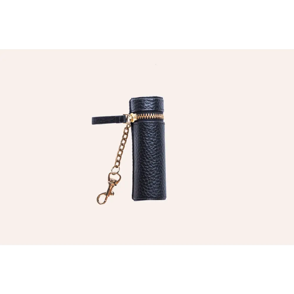 Black leatherette lipstick keeper with gold zipper and chain for stylish storage