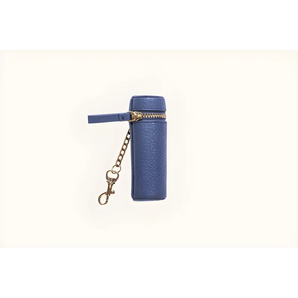 Blue cylindrical zippered pouch, a stylish lipstick keeper in pebble leather holds design