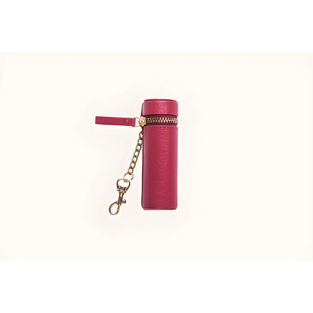 Cylindrical pink lipstick keeper in Gold Accented Pebble Leather Holds Lipstick design