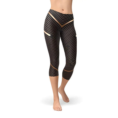 Black and gold patterned capri leggings, perfect for women who love striped lines sports