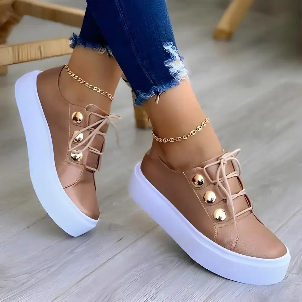 Tan platform sneakers with gold buttons, perfect female running shoes for casual wear