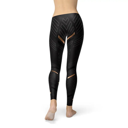 Gold Geo Black Leggings USA feature stylish geometric patterns and women’s sports stripes