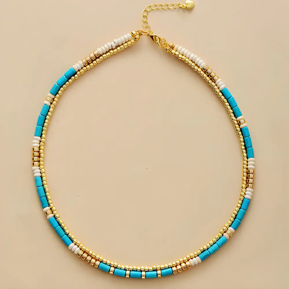 Beaded Turquoise and Gold Necklace featuring unique gold seed beads, perfect for any outfit