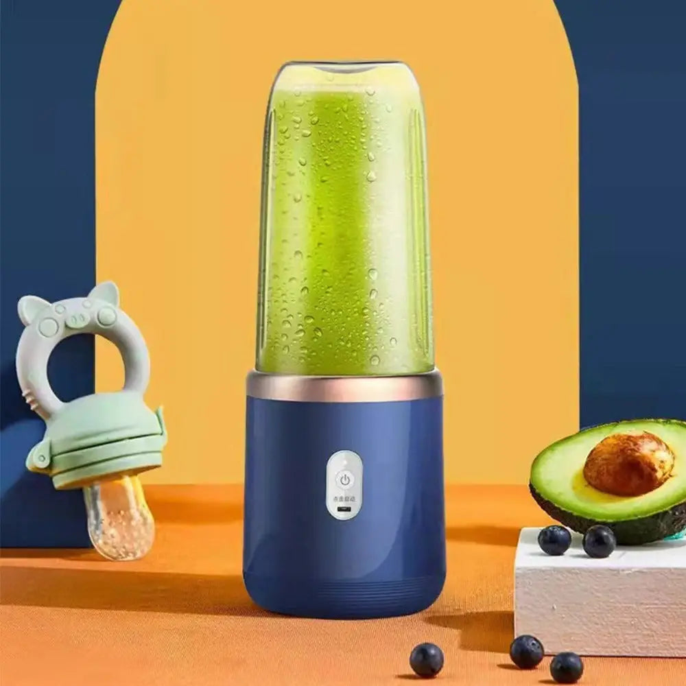 Blue portable juice blender with a green smoothie, perfect for on-the-go blending