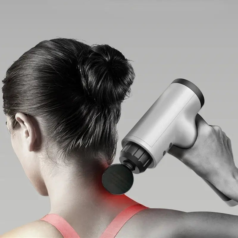 Handheld massage gun for muscle relief, Grab This Gun Tissue Massager in action