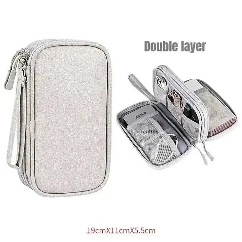 Gray double-layer travel organizer bag for ultimate tech cable storage on the go