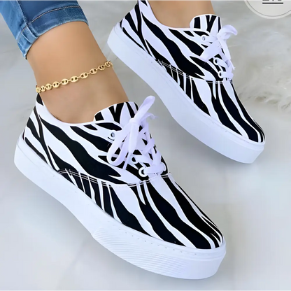 Zebra-striped platform sneakers from Graffiti Women Sneakers for funky fashion kicks