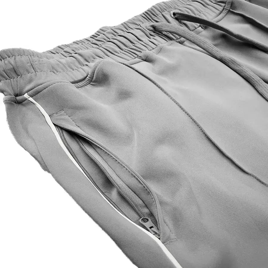 Gray Stacked Flare Track Pants with zippered pocket for stylish, comfy workouts