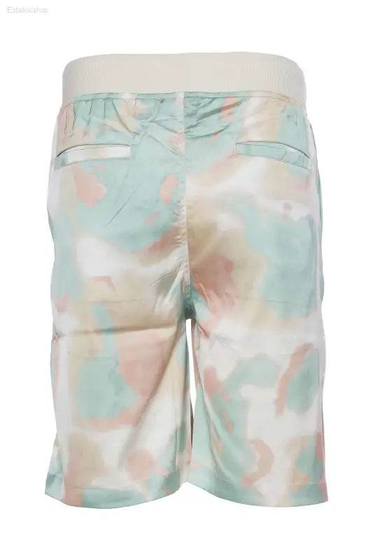 Tie-dye patterned shorts.