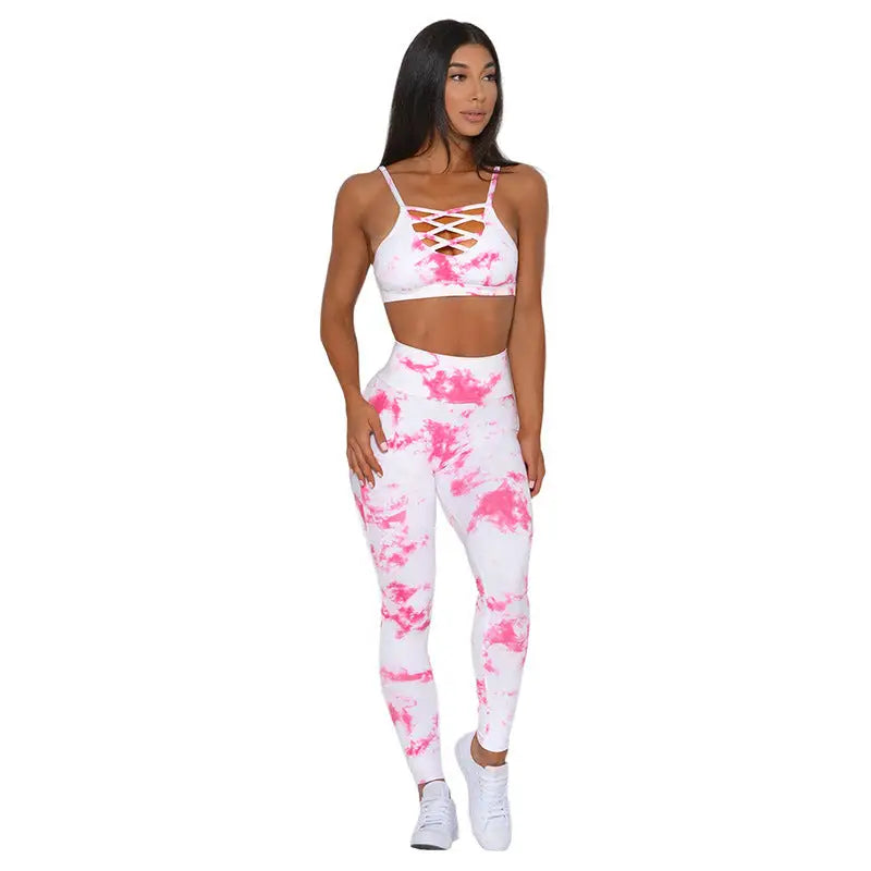 Woman rocking pink tie dye in Groovy Tie Dye Yoga Clothes for stylish workouts