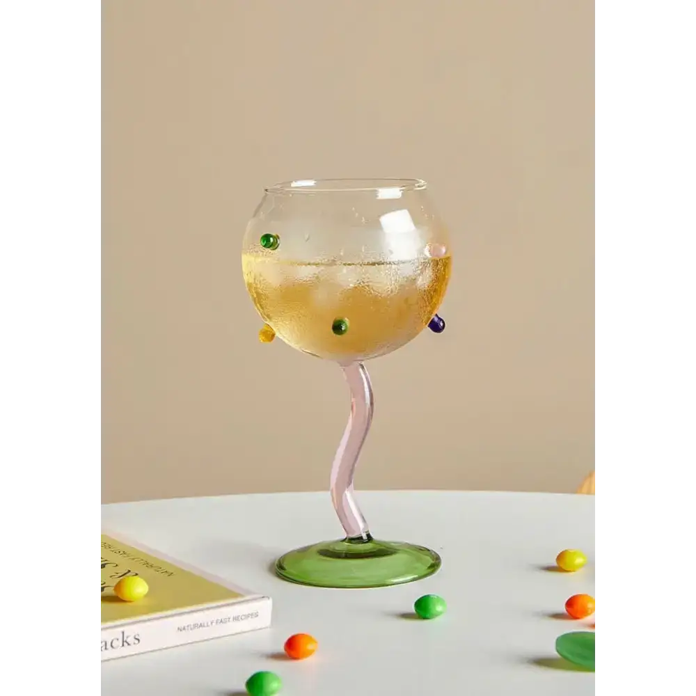 Whimsical hand blown rainbow sprinkles wine glass with colorful beads for fun sips