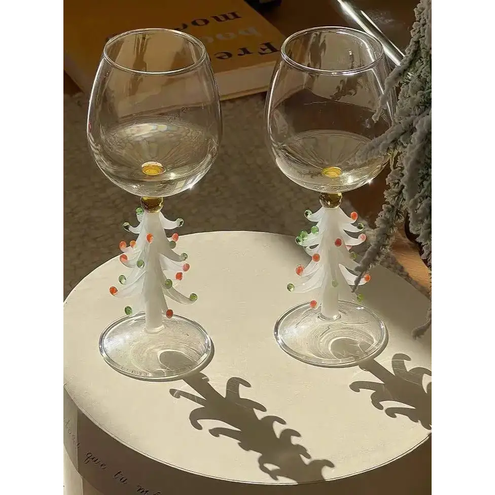 Handblown Christmas Tree Wine Glasses featuring charming two Christmas tree designs