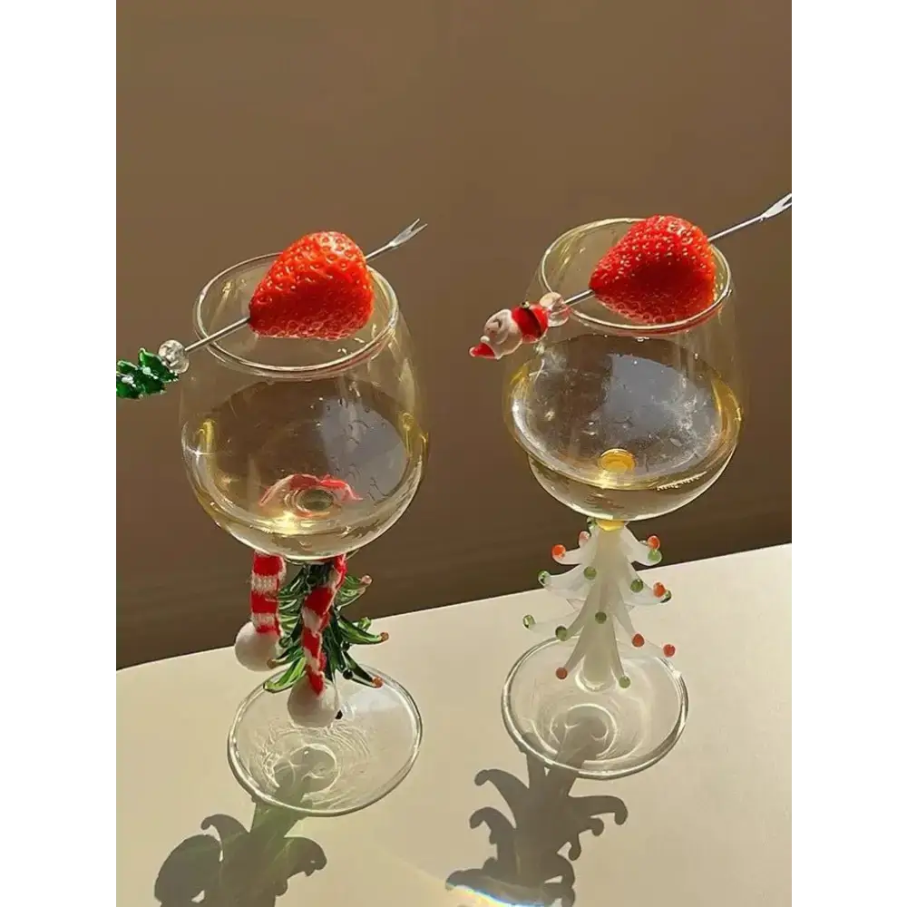 Festive handblown Christmas Tree Wine Glasses perfect for holiday celebrations