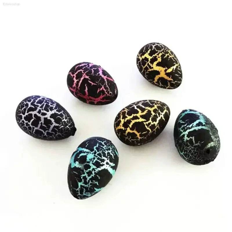 Cracked, colorful dinosaur eggs.