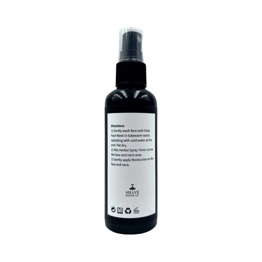 Black spray bottle with instructions for Herbal Spray Toner in a sleek design