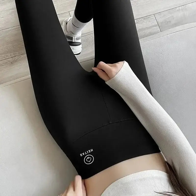 High Waisted Seamless Leggings for Sports & Fitness in sleek black color