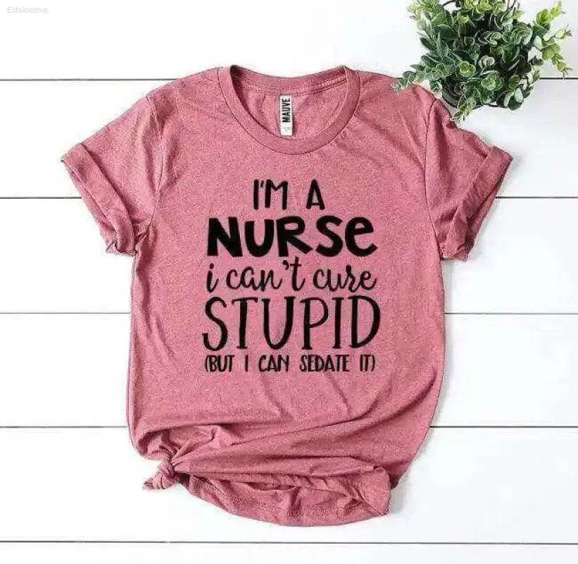 Pink t-shirt with a humorous nurse-themed slogan.