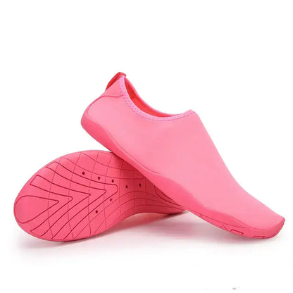 Pair of pink water shoes from Hot Shoe Deals for stylish summer fun