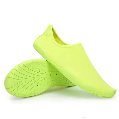 Pair of lime green water shoes from Hot Shoe Deals for stylish summer fun