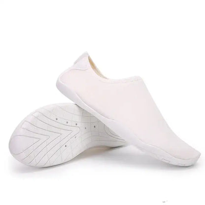 Stylish pair of white slip-on shoes from Hot Shoe Deals Womens Shoes collection