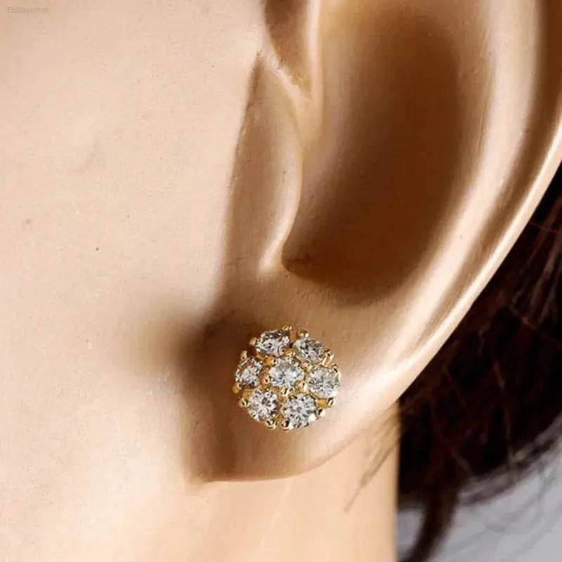 Gold and diamond cluster stud earring.