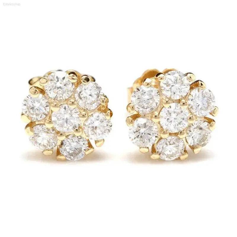 Gold and diamond cluster earrings.