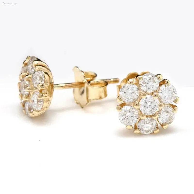 Gold and diamond stud earrings.