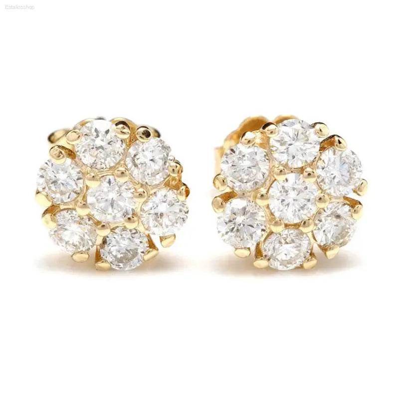 Gold and diamond cluster earrings.